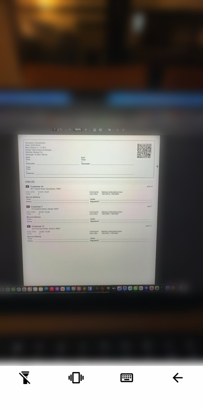 The QR scanner open on a printed run sheet