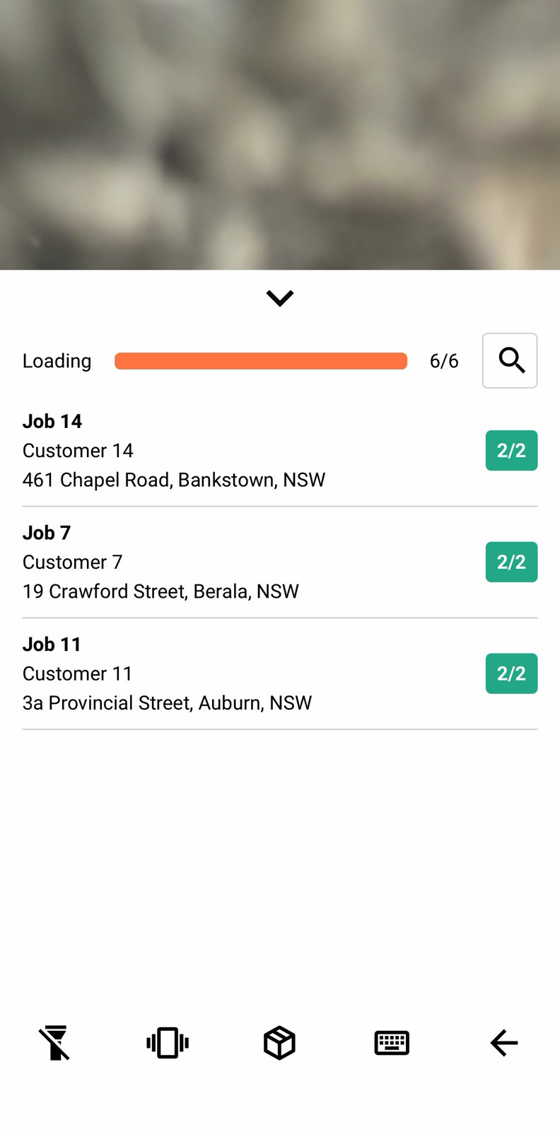 The job list expanded over the live camera view