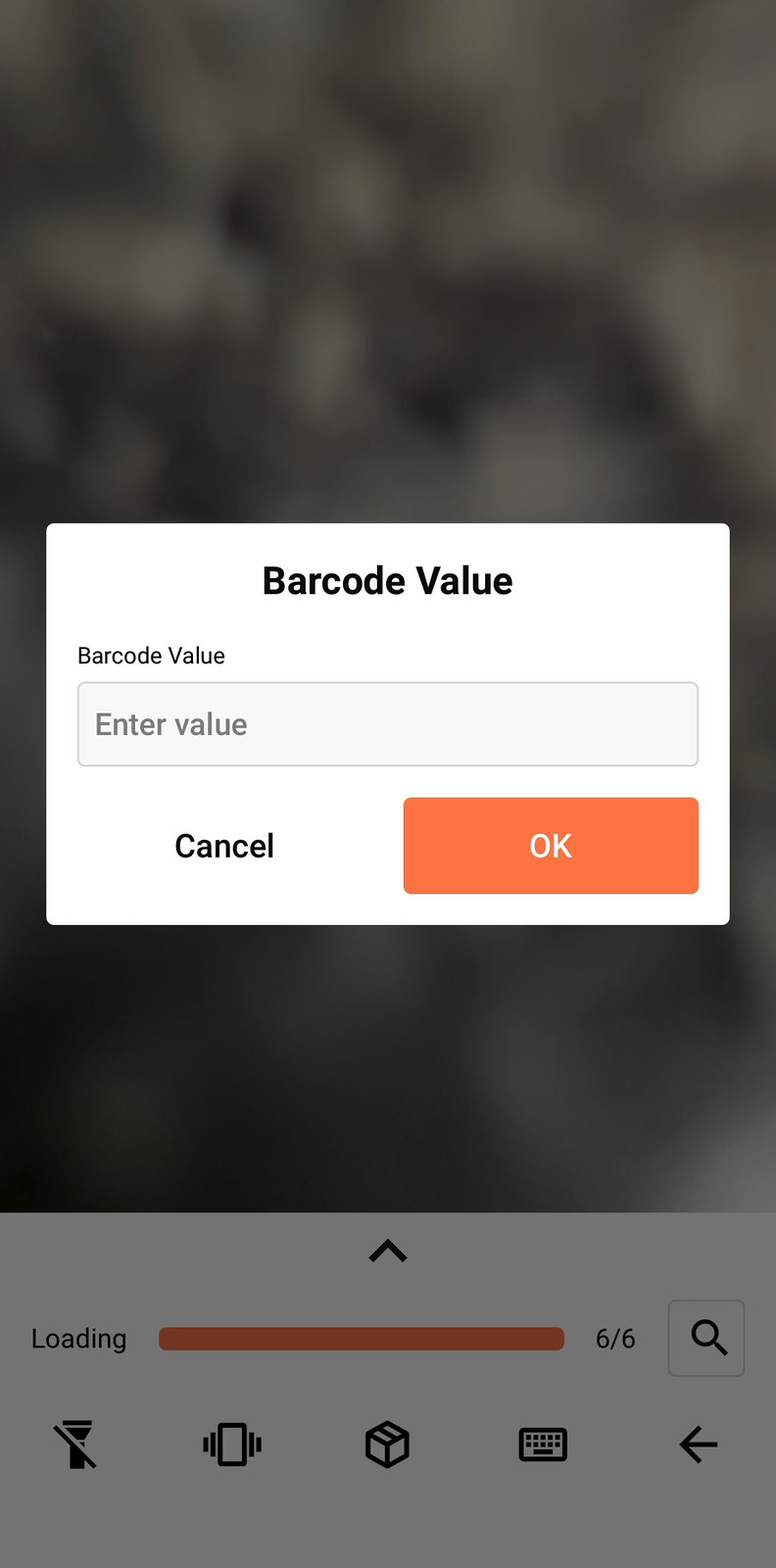 The manual barcode entry modal, with a Barcode Value field and Cancel / OK